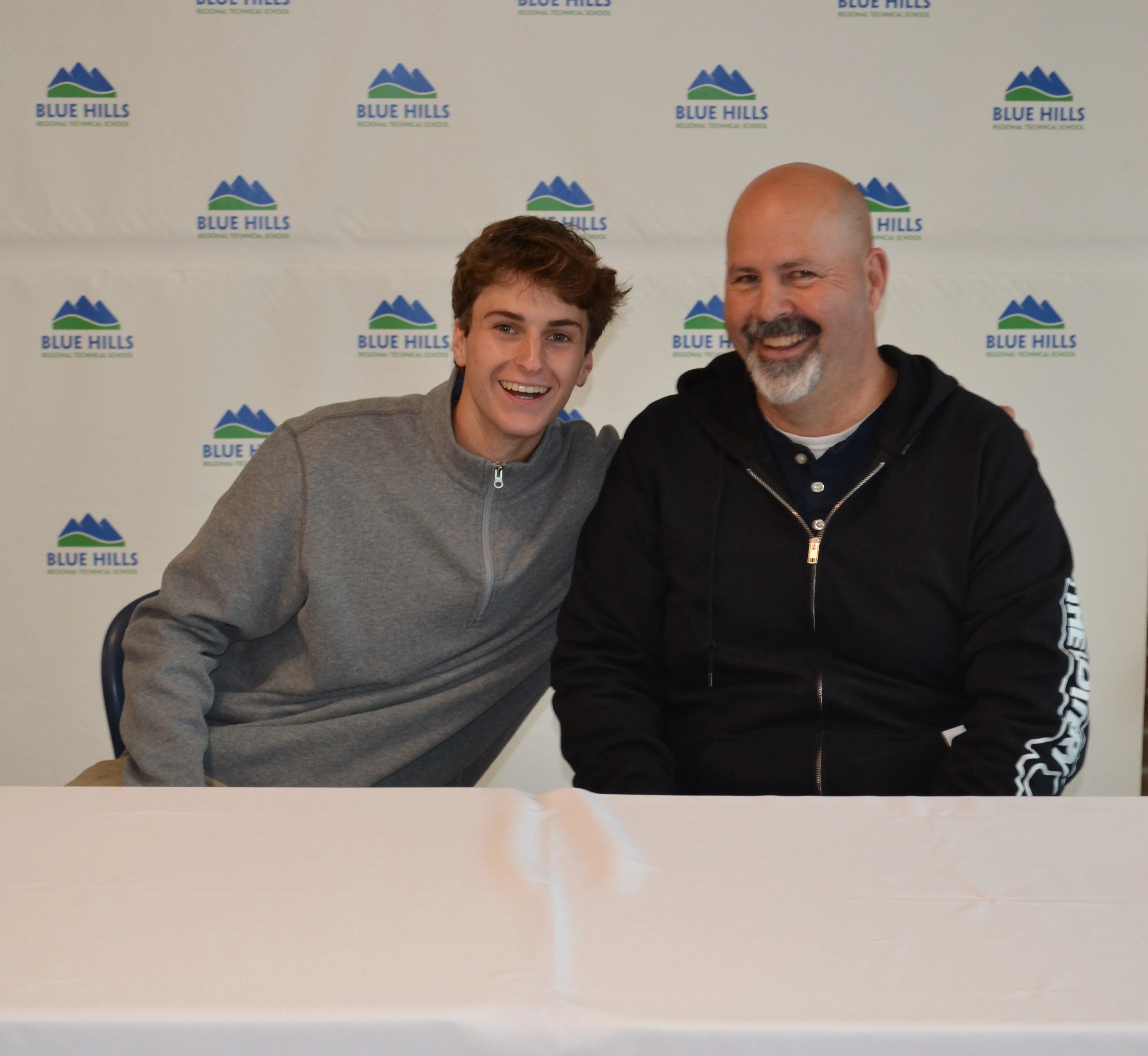 Jack DeAngelis posing with metal fabrications instructor, Brian Gearty.