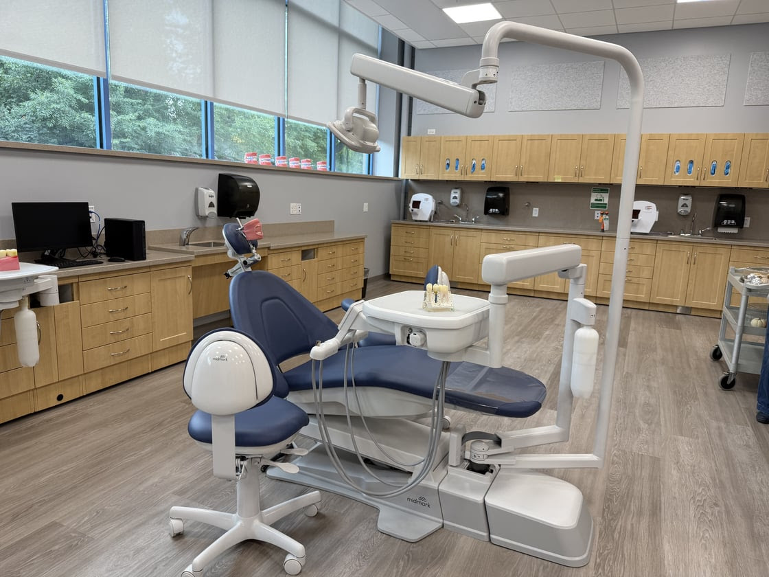 Image of dental chair with various tools